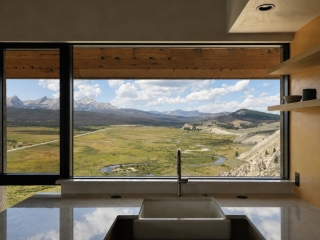 Sawtooth Retreat 03_Galczynski Sawtooth Retreat Kitchen and Creek in Stanley Idaho